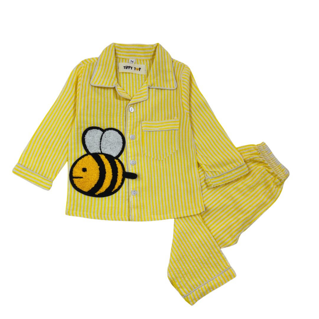 Yellow striped pajama set with a bee design on a white background