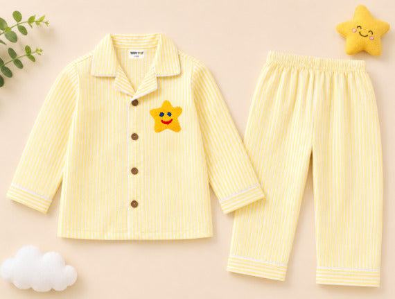 Kids yellow striped star patch night suit – flat lay product view