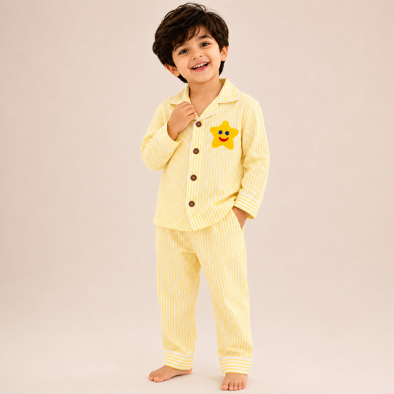 Kids yellow striped cotton night suit with smiling star patch – front view
