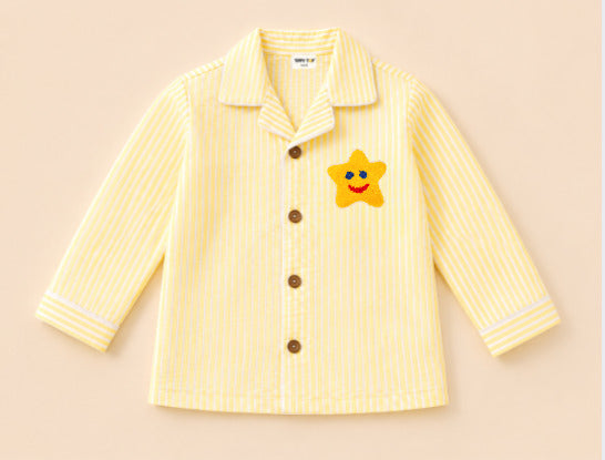 Kids yellow striped star patch night suit – child wearing side view