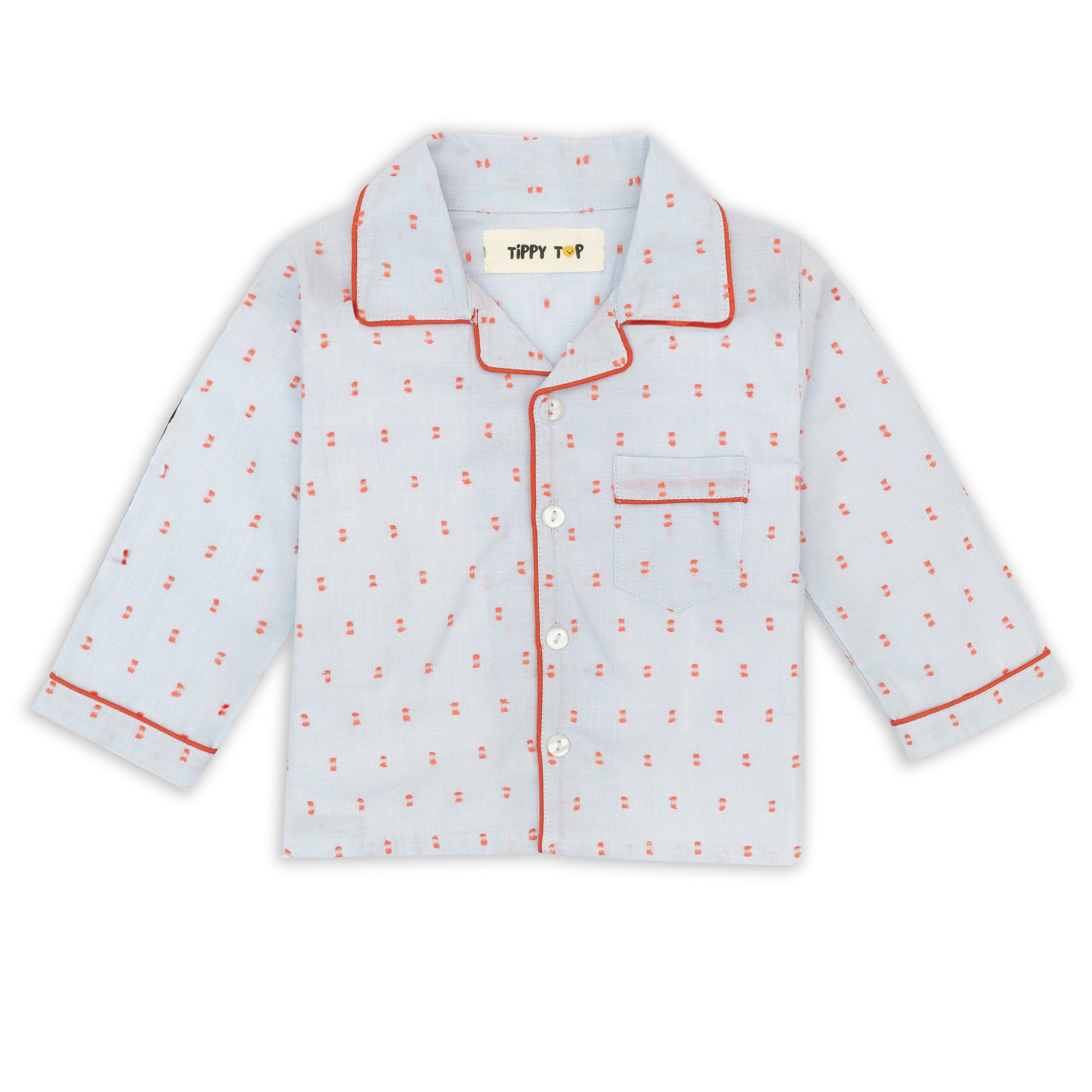 Children's pajama top with red pattern on a white background