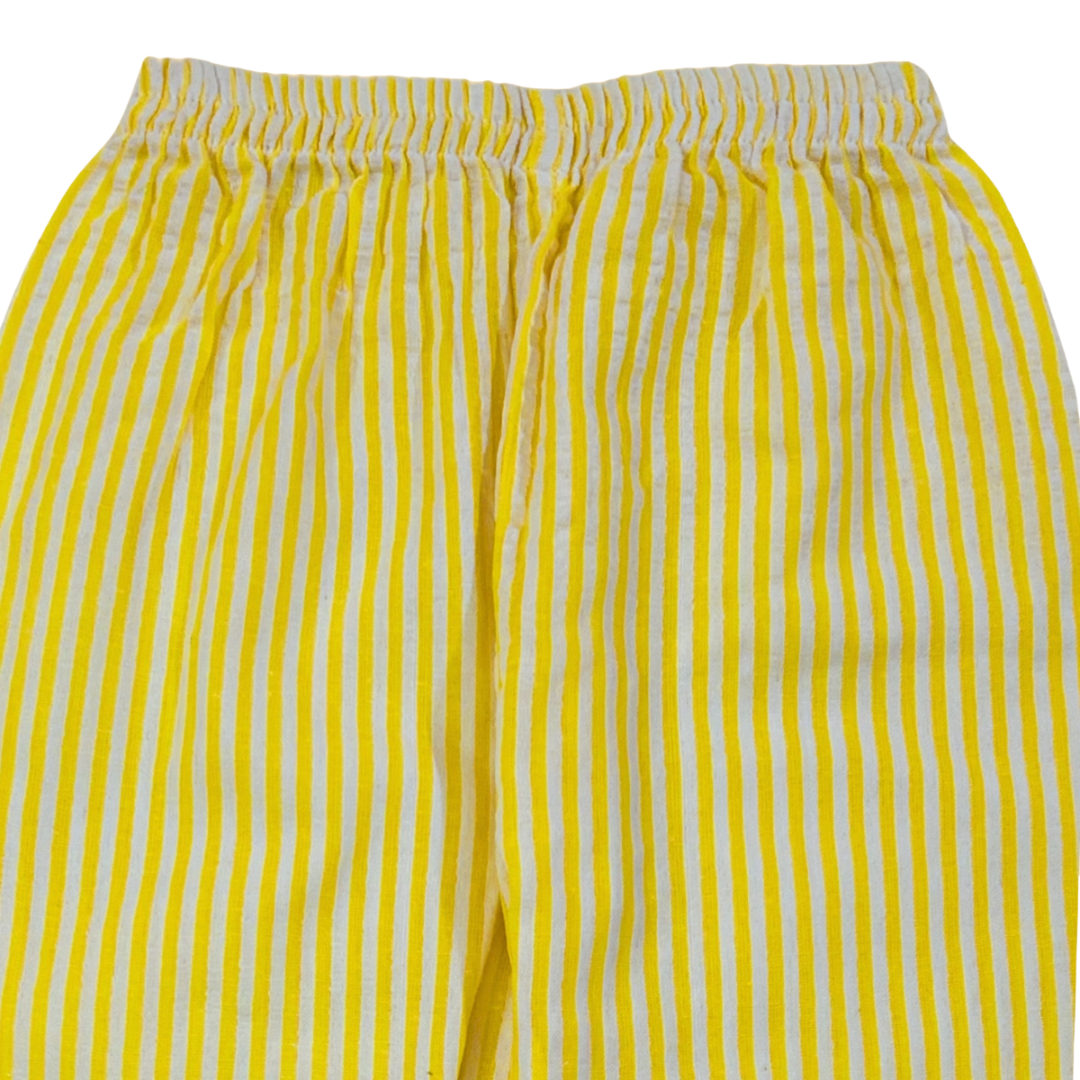 Yellow and white striped shorts on a white background