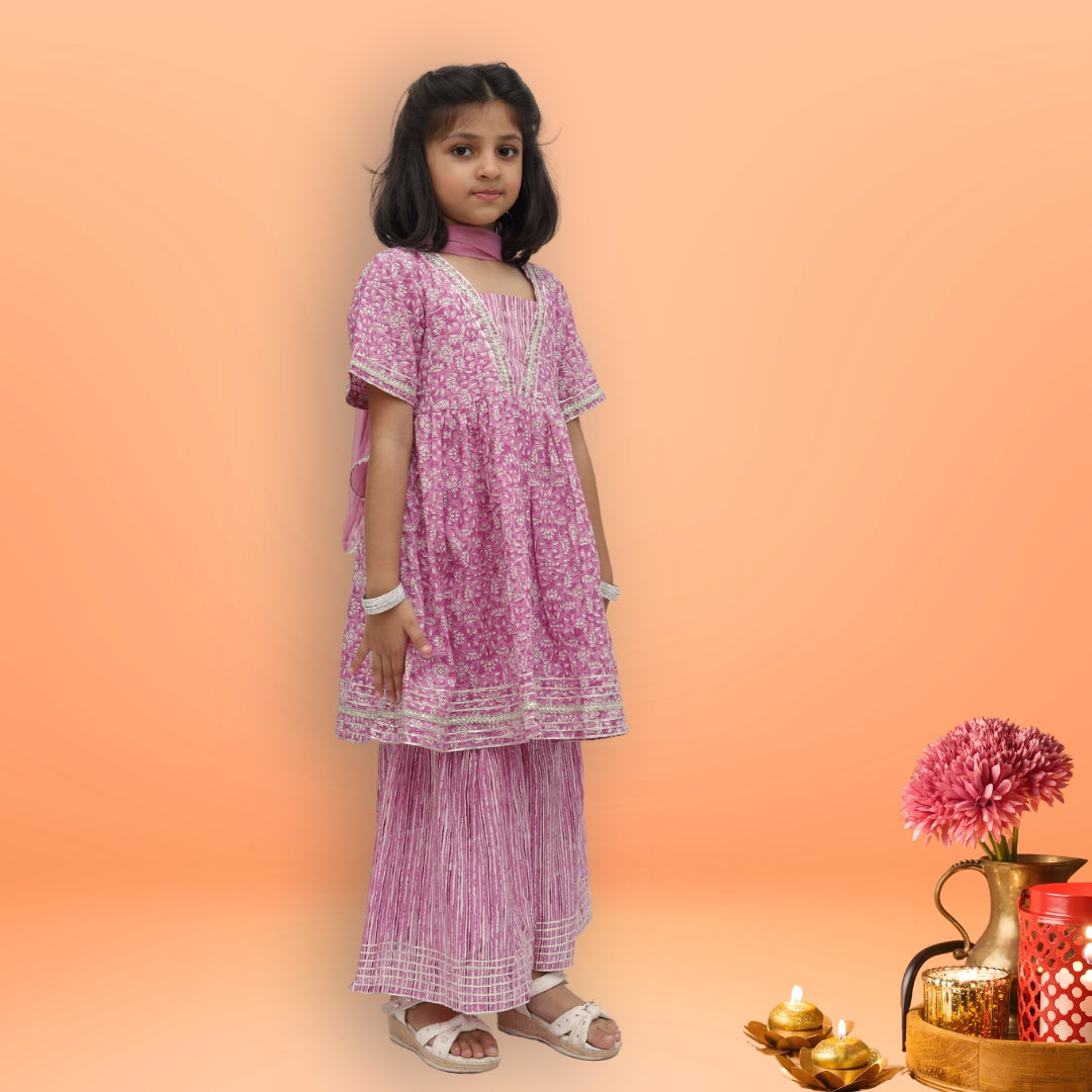 Girl wearing purple cotton printed sharara set with floral kurta and striped sharara pants – Tippy Top ethnic wear