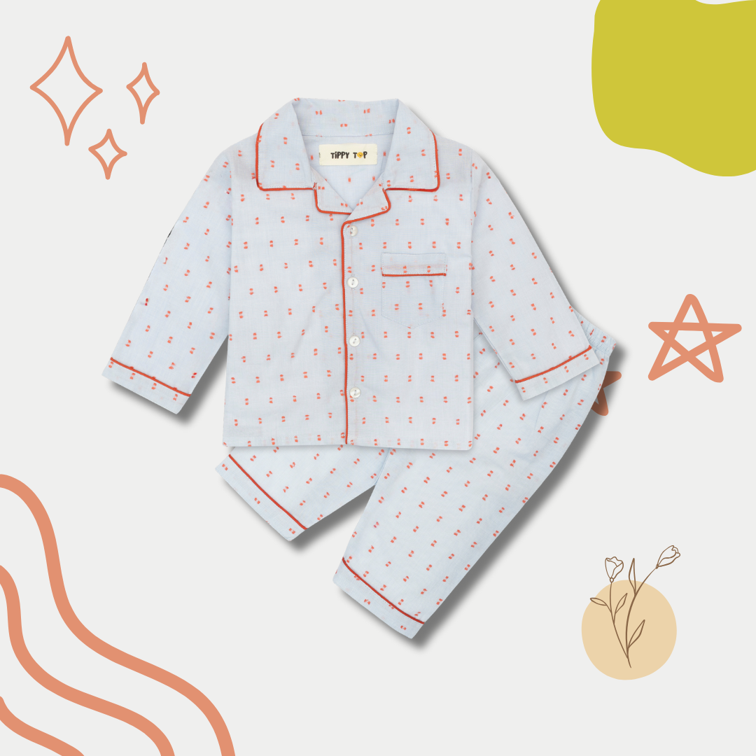 Light blue pajama set with red accents on a white background