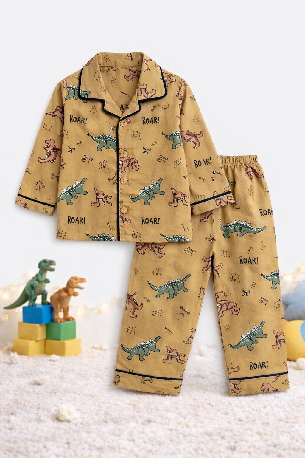 Boys brown dinosaur print night suit – flat lay product view