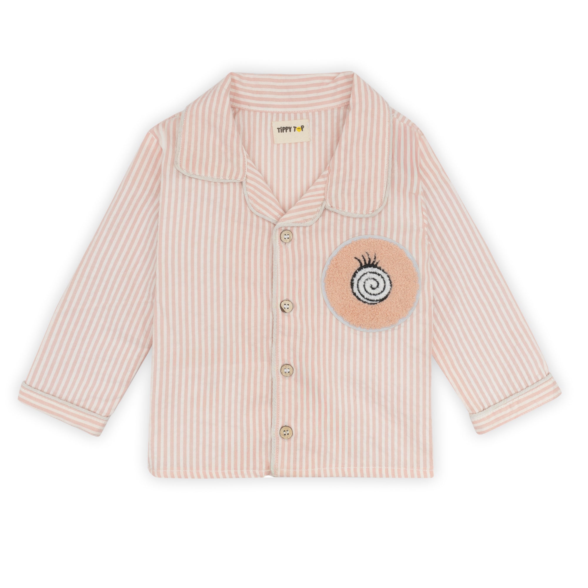 Beige striped shirt with a circular patch on a white background