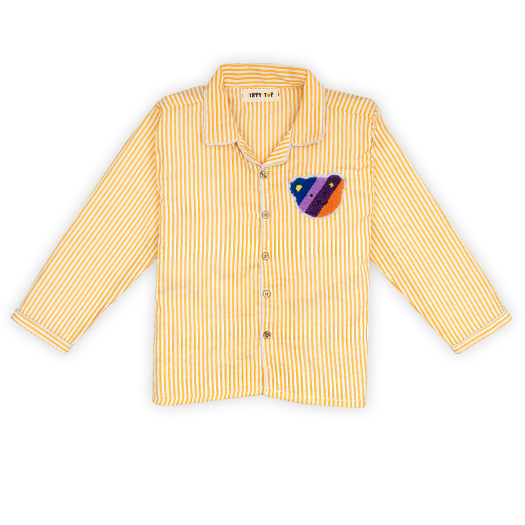 Yellow striped shirt with a colorful heart patch on a white background