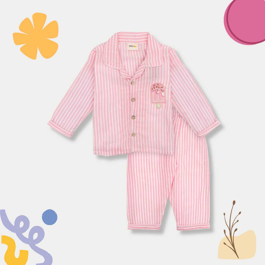 Pink striped pajama set on a light gray background with decorative elements.