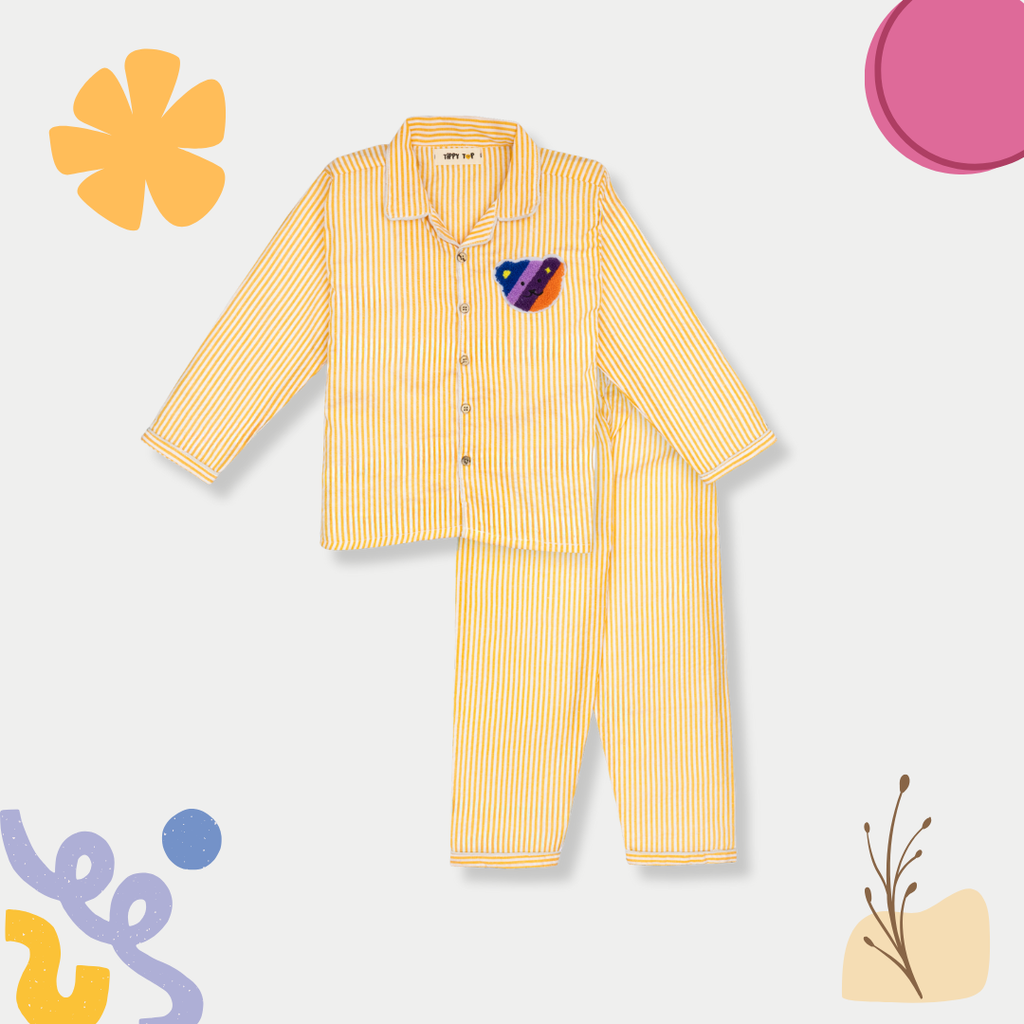 Yellow striped pajama set with a colorful heart on the chest against a light gray background.