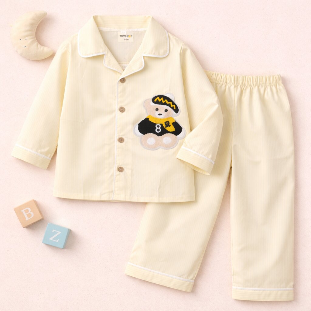 Kids yellow cotton night suit with teddy patch – flat lay product view