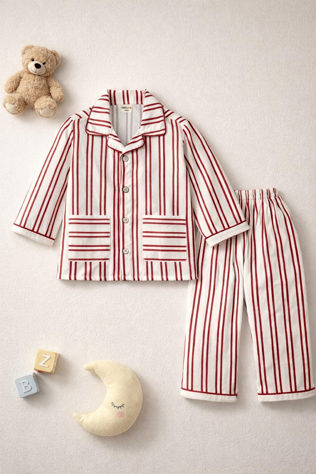 Kids off white striped cotton night suit with dual pockets – front view
